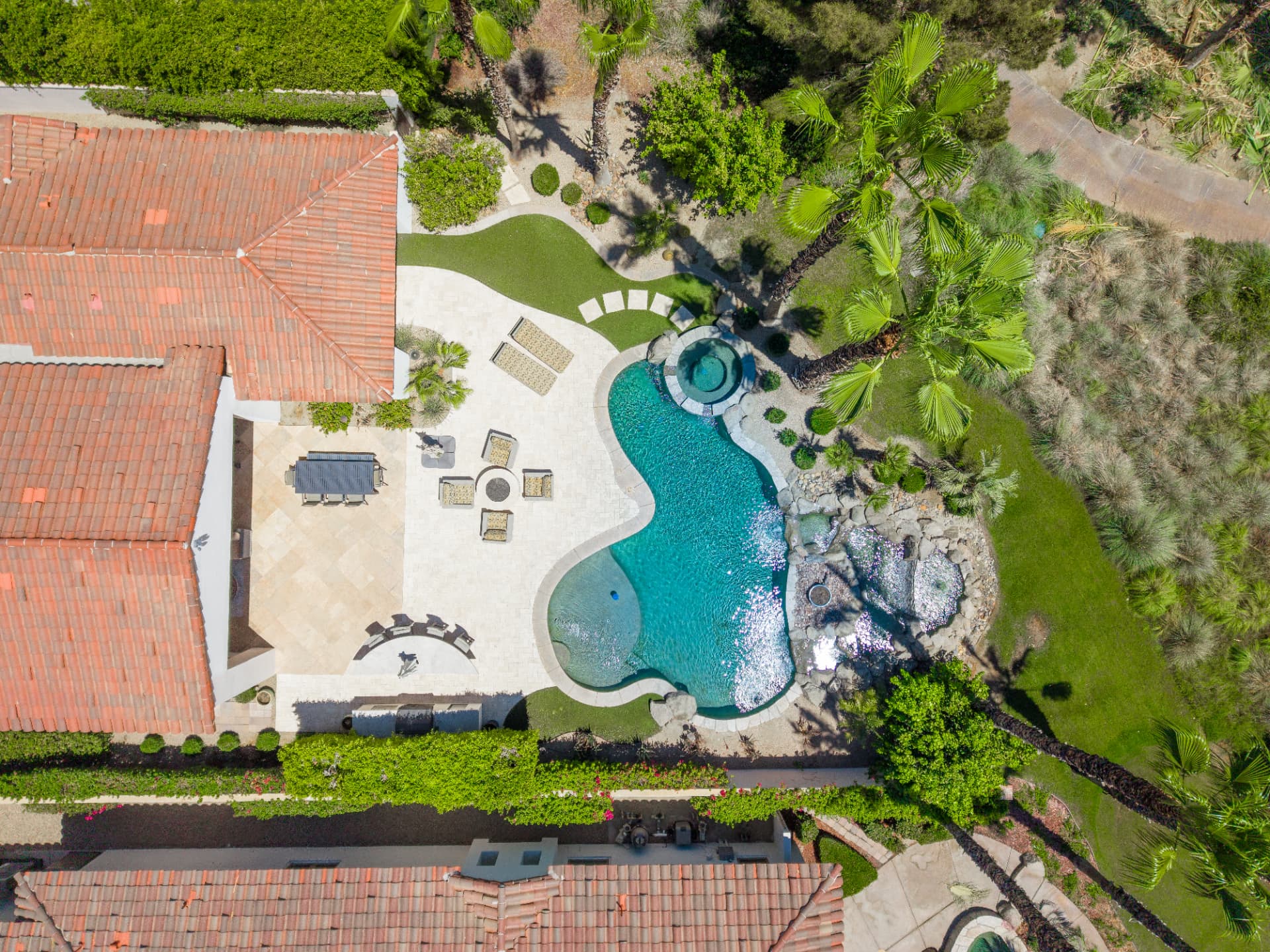 Overhead view of the pool, spa and travertine patio