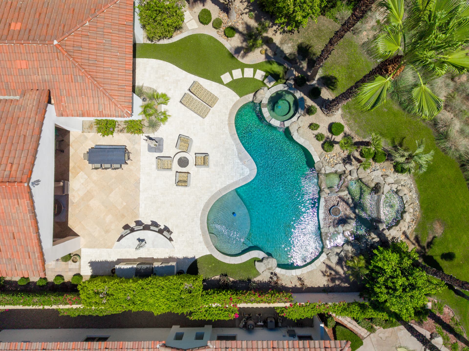 Bird's eye view of the pool deck, lounge and putting green