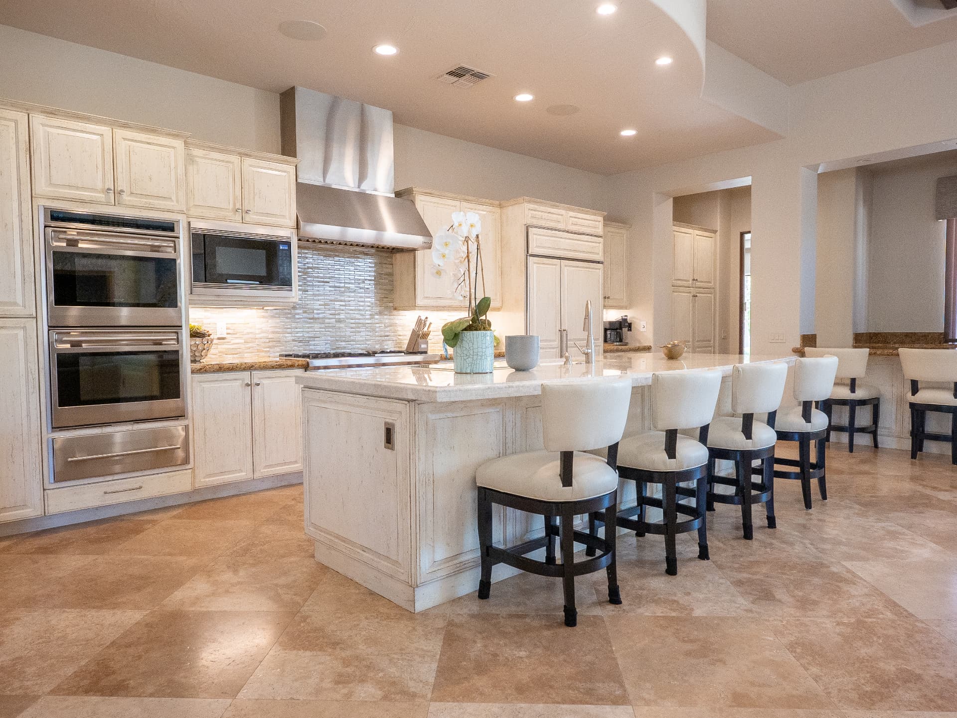 Chef's kitchen with oversized island and custom cabinetry